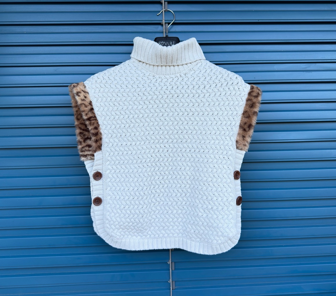 PULL SANS MANCHES ENFANT ASPEN - photo 1 sur TheSwissDeal