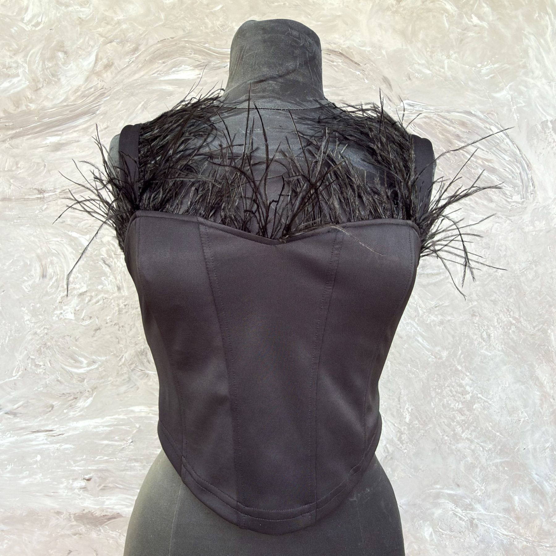 Bustier corset noir à plumes - photo 1 sur TheSwissDeal